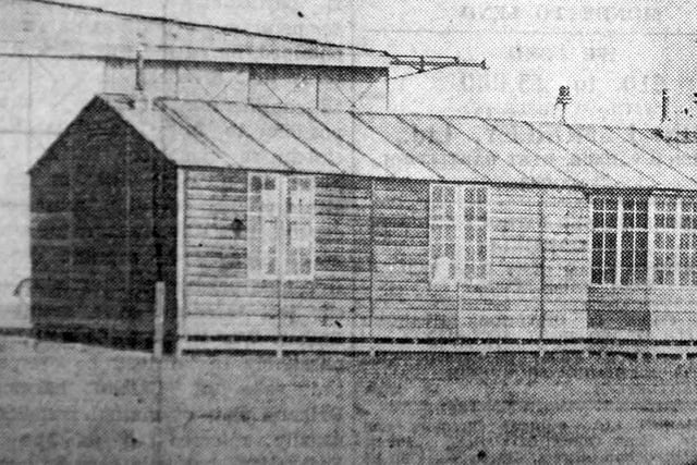 A grainy view from April 1939 of the air traffic control building at Greatham Airport.