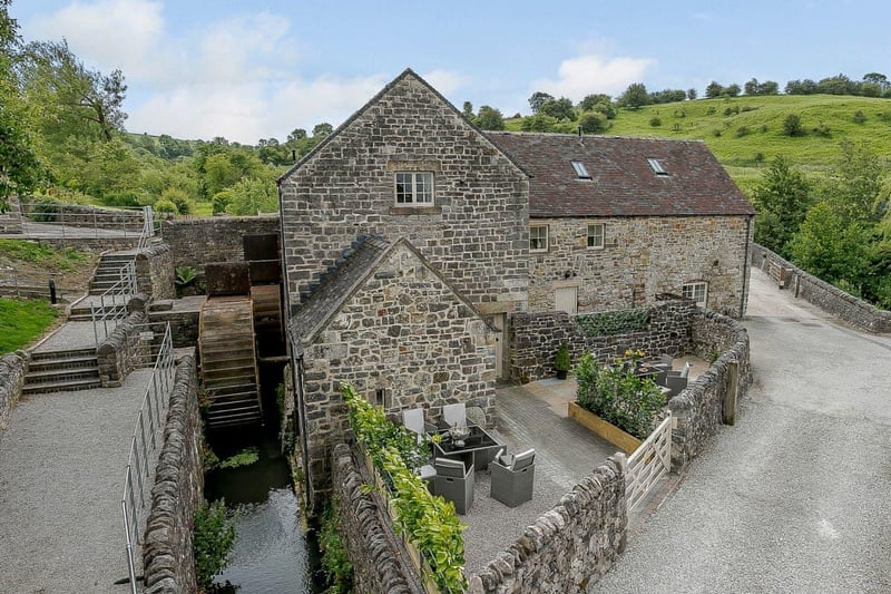 The Water Mill, at Bradbourne just outside the Peak District boundary near Ashbourne, sleeps 16. Grade II listed, it is described as a 'truly unique property' containing luxury fittings and original historic features. (https://www.cottages.com/cottages/the-water-mill-ukc4031)