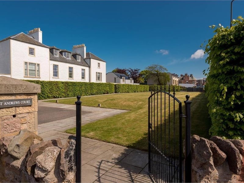 Gated entrance to development.