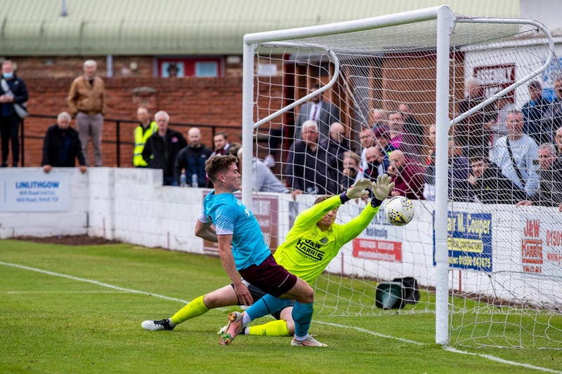 Hearts forward Euan Henderson, who played the second half, sees his effort saved by Linlithgow goalkeeper Lewis McMinn (Photo by Craig Brown / SNS Group)