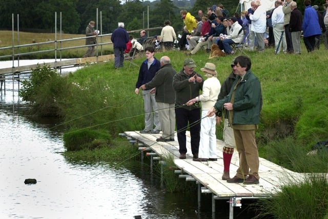 Fly fishing demonstrations on the river in 2002