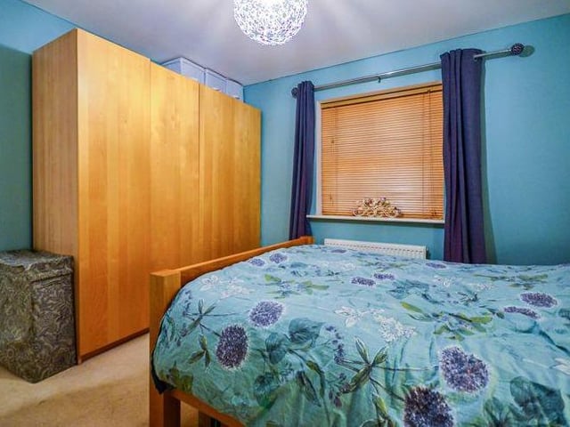 A second shot of the master bedroom, showing that there is plenty of space for wardrobes and storage.