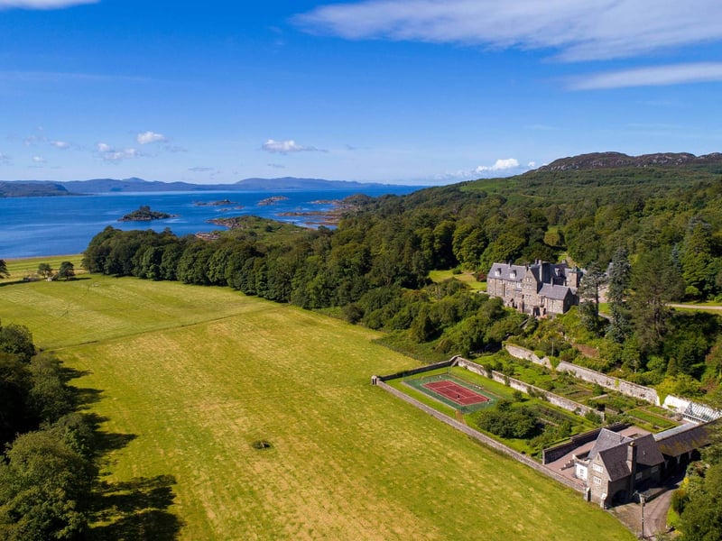 Aerial view of house and estate.