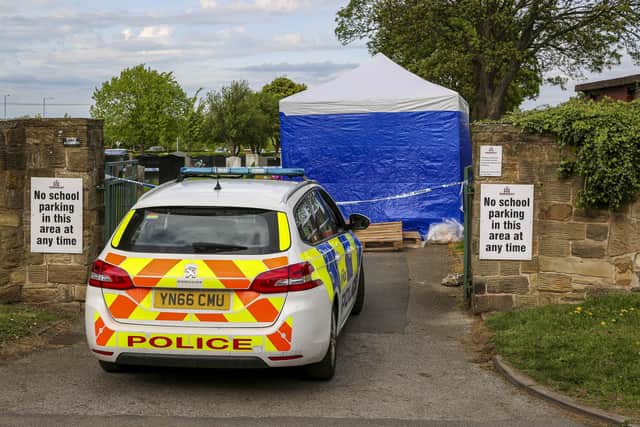 Police have remained at a South Yorkshire cemetery for another day as investigations continue over a partially dug up grave.
