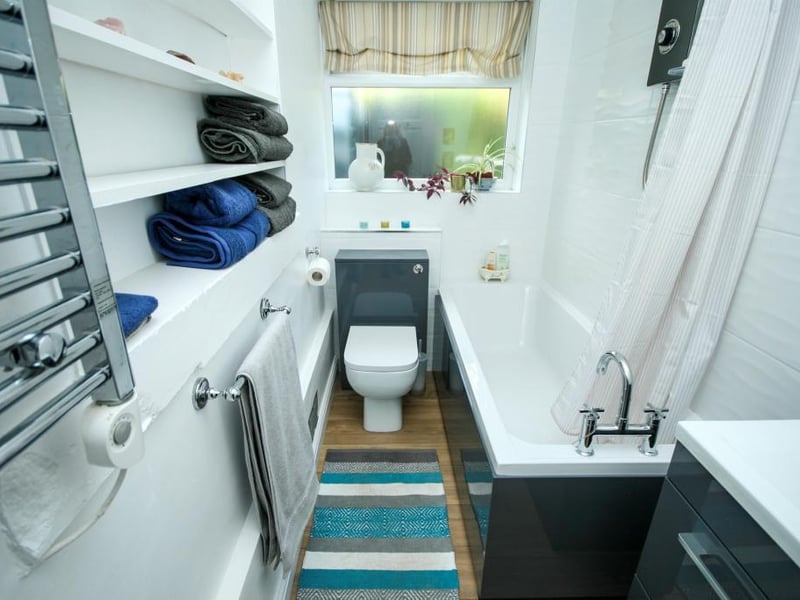 Newly fitted with a three piece suite comprising bath with electric shower over, wash hand basin in vanity unit, low level push button WC.