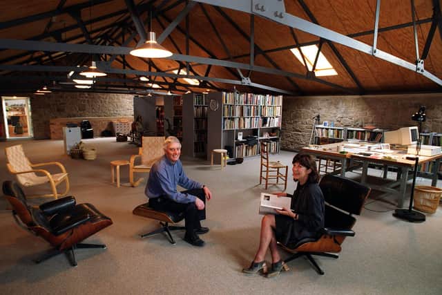 David Mellor and Fiona MacCarthy in the library/workroom of their home in Hathersage in the 1990s.