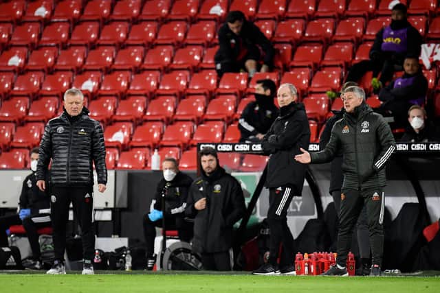 Sheffield United manager Chris Wilder and his Manchester United counterpart Ole Gunnar Solskjær will lock horns at Old Trafford on Wednesday night.  (Photo by Peter Powell - Pool/Getty Images)