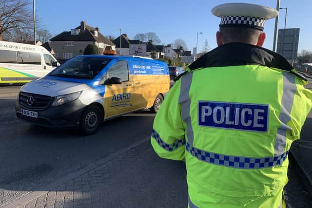Police on a mobile phone operation. Picture: Ben Fishwick