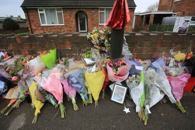 Floral tributes in Killamarsh in memory of Ricky Collins.