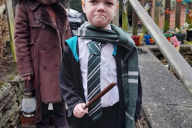 This Draco Malfoy doesn't look happy! Can you guess the character behind?