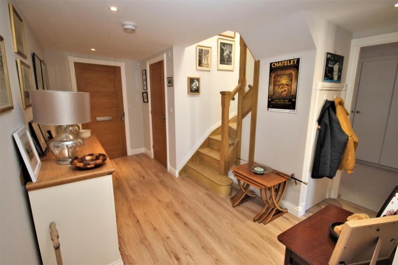 The oak staircase completes the cosy entrance hall.