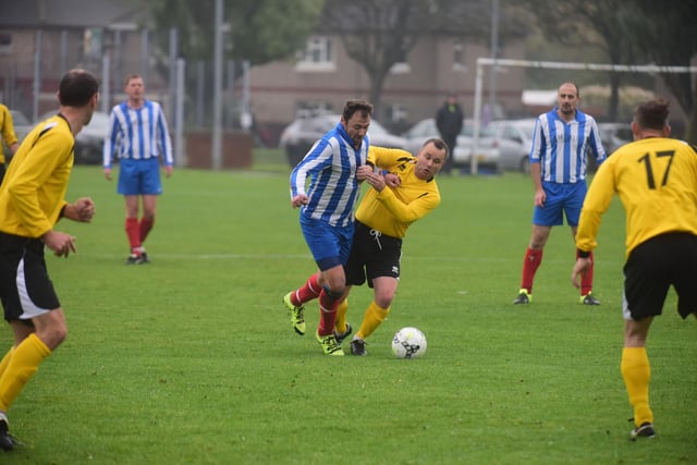 On the pitch action between Touchdown (blue/white) v Marden (yellow) at King George V fields. Remember this from 2016?