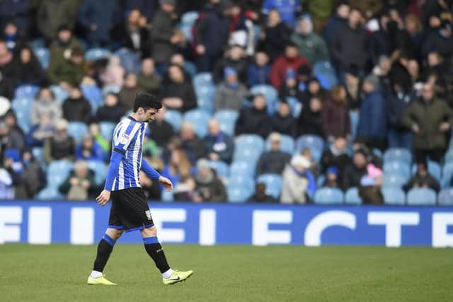 A dejected Fernando Forestieri shuffles off from the Hillsborough pitch at half-time in Sheffield Wednesday's 3-1 defeat to Derby County.