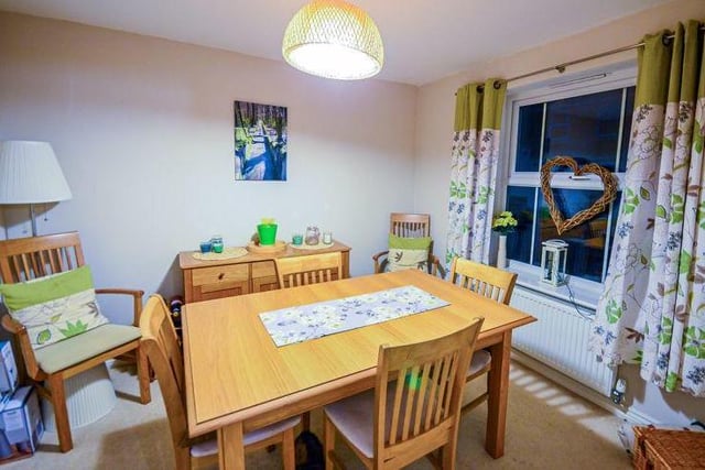 This is the separate dining room, which can also be found off the hallway. Suitable for a family meal in cosy surroundings.