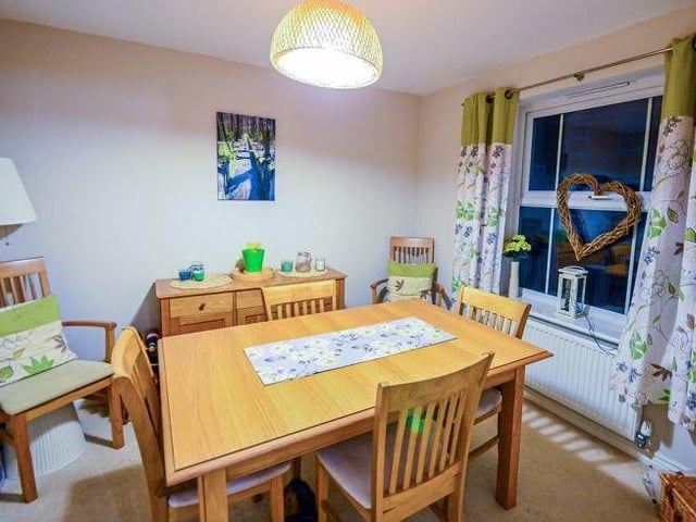 This is the separate dining room, which can also be found off the hallway. Suitable for a family meal in cosy surroundings.