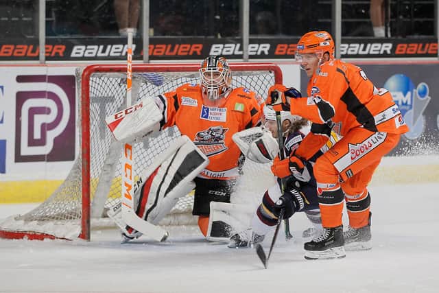Jonas Liwing defends against Guildford. Pic by Hayley Roberts.