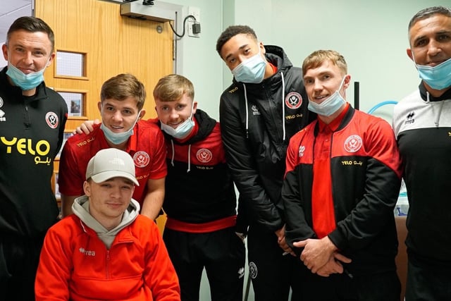 Boss Paul Heckingbottom and coach Jack Lester joined players in spreading festive cheer