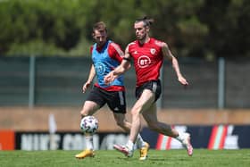 Gareth Bale and Rhys Norrington-Davies of Wales during a Wales training session in Lagos, Portugal. (Photo by Fran Santiago/Getty Images)