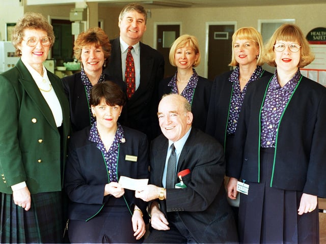 Staff from Doncaster's Marks and Spencer store on Baxtergate presented £10,039 to the St johns Hospice Appeal in 1998. Pictured presenting the cheque is Marks and Spencer main organiser Anne Chatfield seated left and president of the hospice appeal Lord Walker. witnessing the presentation are,left to right, retired deputy supervisor Anne Brown , Joan Sprakes, store manager Graham Moss, Anne Cross, Jean Silcock and Anne Strudwick.