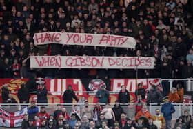 Fans display a banner during the Sky Bet Championship match at the Riverside Stadium, Middlesbrough. Picture date: Saturday February 12, 2022.