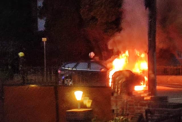 Firefighters were called to the scene on Bawtry Road, Bessecarr, on Sunday evening, where the car was said to be 'well alight'