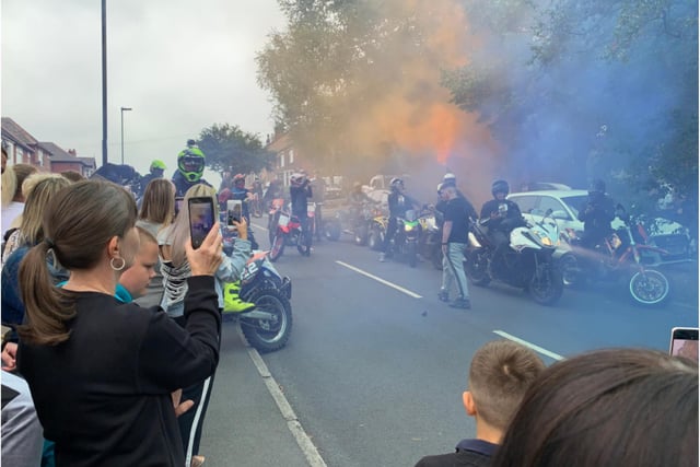 Blue and yellow smoke bombs were set off in Willy Collins' honour.