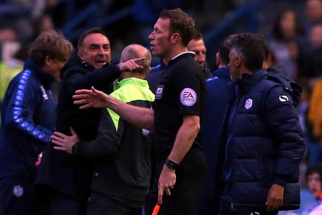 Carlos Carvalhal manager of Sheffield Wednesday (2ndL) reacts after Fernando Forestieri had his goal disallowed during the Sky Bet Championship Play Off First Leg between Sheffield Wednesday and Brighton & Hove Albion at Hillsborough on May 13, 2016 in Sheffield, England.  (Photo by Nigel Roddis/Getty Images)