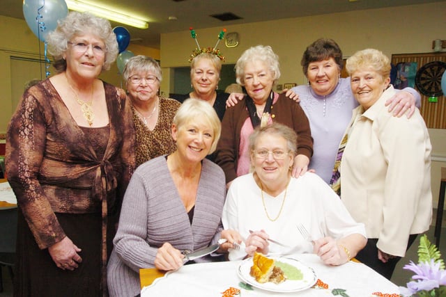 Ladies at Rydale Walk Community Scentre, Scawsby, celebrate with a pie and pea supper after raising £500 for St John's Hospice and Doncaster Cancer Detection Trust in 2007. Back L-R are Kathleen Ellis, Joan Simpson, Jean Bunting, Olwen McLaren, Vera Courtney, and Anne Tudor, front L-R are Carol Spiller, Executive Member od Doncaster CDT, and Pat Garner.