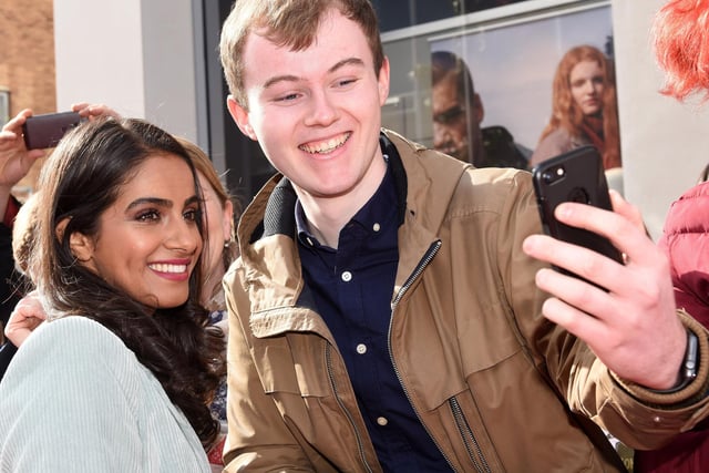 Mandip Gill, who plays Yaz, has a selfie with a fan at the Doctor Who premiere screening at the Light, The Moor.