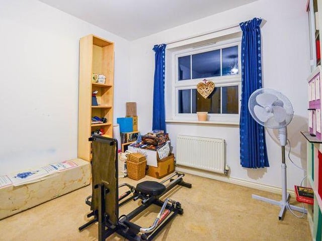 The fourth and final bedroom at the James Street house is versatile, and could even be turned into a mini-gym for your daily workouts.