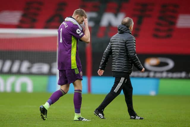 Aaron Ramsdale and Chris Wilder of Sheffield United after their side's 3-0 defeat during the Premier League match between Southampton and Sheffield United at St Mary's Stadiu:  Robin Jones/Getty Images