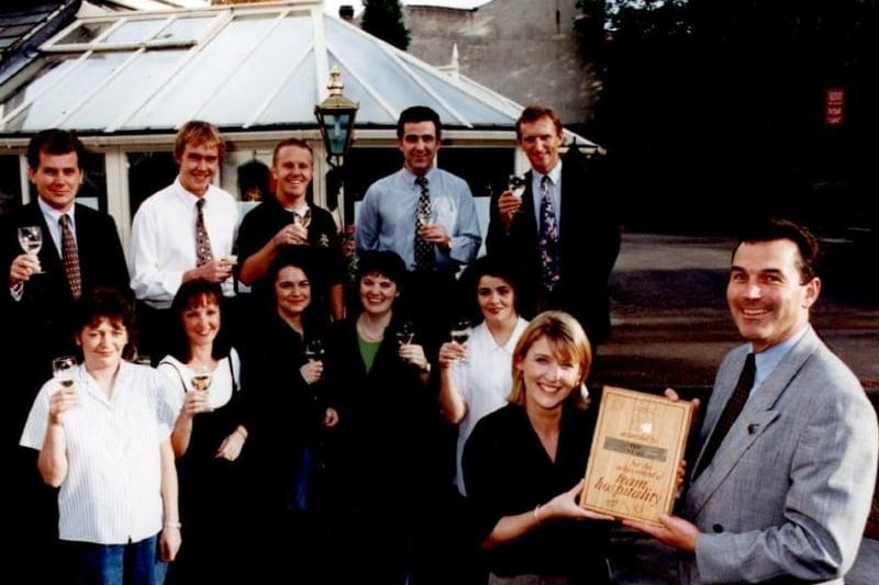 Staff and customers celebrating The Stag on Psalter Lane getting a service award in 1997