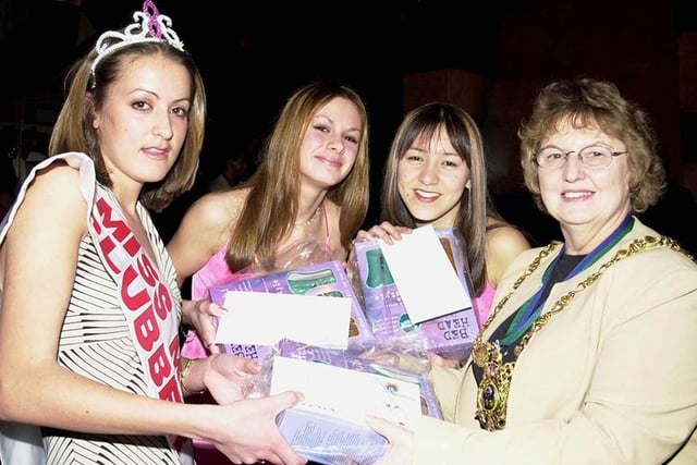 Miss Massive Clubber - Winner Lucy Gordon (left) pictured receiving her prize from the Lord Mayor of Sheffield Councilor Pat Midgley (right). Also pictured are runners up Nikola Godfrey and Rachel Beddell.  March 2001