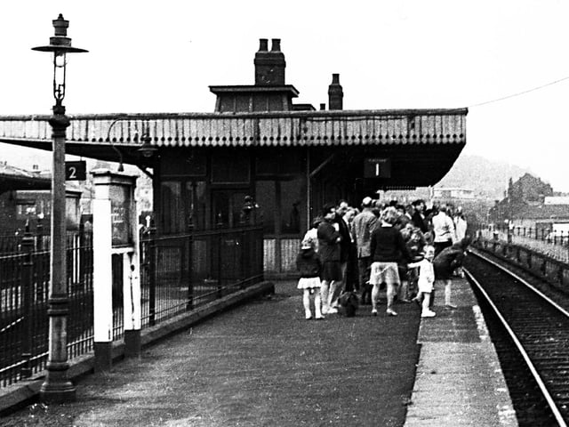 Travellers on the platform at Heeley Railway Station