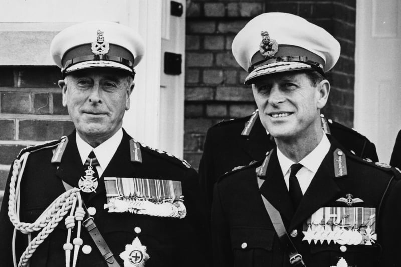 Earl Mountbatten (left), Admiral of the Fleet, and the Duke of Edinburgh, wearing formal military uniform, on the main parade at the Royal Marine Barracks, Eastney, Southsea, October 27th 1965.