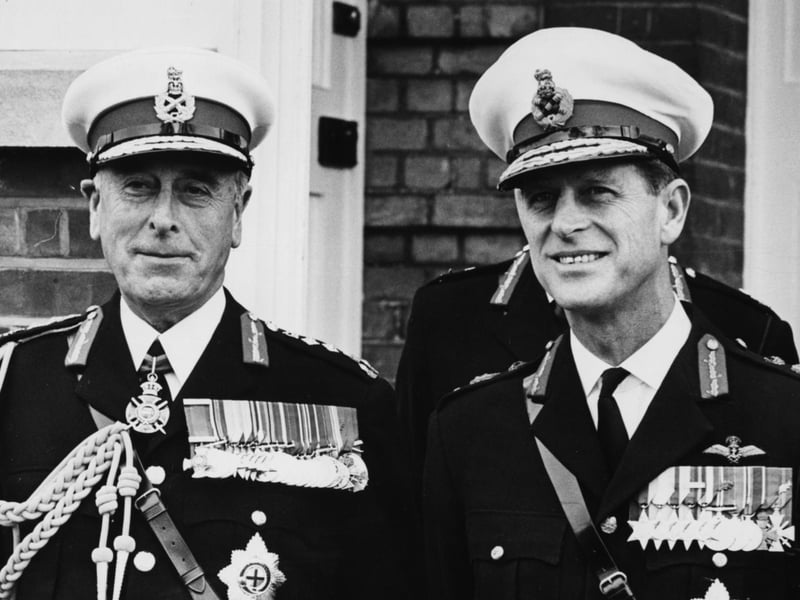 Earl Mountbatten (left), Admiral of the Fleet, and the Duke of Edinburgh, wearing formal military uniform, on the main parade at the Royal Marine Barracks, Eastney, Southsea, October 27th 1965.