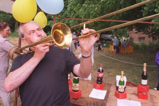 St Lukes Hospice Fair, pictured is Malcolm Rapson trumpeting up support for the Hoopla stand in 1997