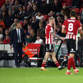 Sheffield United manager Slavisa Jokanovic (left) and Birmingham City manager Lee Bowyer (right) gestures on the touchline during the Sky Bet Championship match at Bramall Lane, Sheffield. Picture date: Saturday August 7, 2021. PA Photo. See PA story SOCCER Sheff Utd. Photo credit should read: Nigel French/PA Wire.