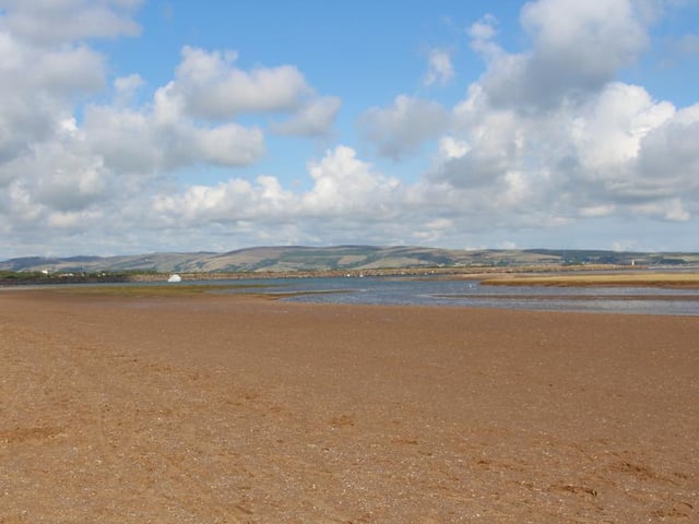 Haverigg beach is located at the mouth of the Duddon Estuary, boasting views over the Lake District fells. Haverigg features large sand dunes, a shingle beach and a large vast expanse of sand (Photo: Shutterstock)