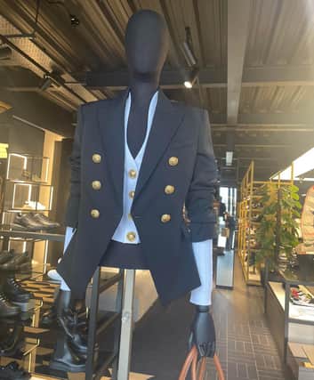 One of the most expensive items in the store is this black and gold woman's blazer with a price tag of £1,750