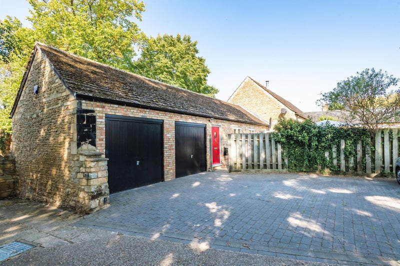 The property boasts off-road parking for two vehicles and a double garage.
