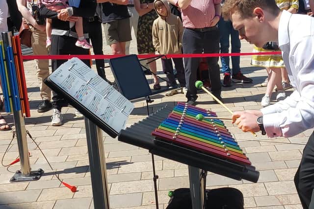 Leeds-based percussionist Michael Armitage was on hand at the opening of Sheffield's new musical pocket park today to demonstrate how to play every instrument.