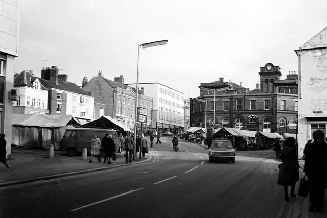 Chesterfield then and now. The market hall as seen in the 1970's, before the creation of the pedestrianised New Square.