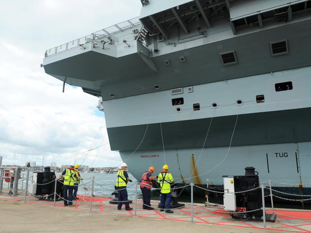 Britain's biggest warship HMS Queen Elizabeth pictured returning to Portsmouth after 10 weeks at sea, carrying out critical training. Picture: (020720-857)