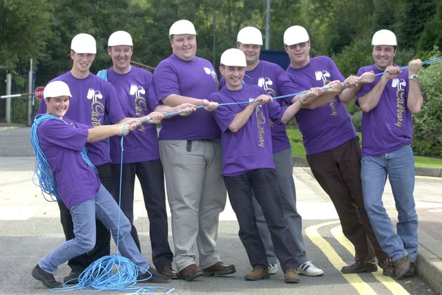 Sheffield Cadbury Trebor Bassett employees who took part in an abseil at Millers Dale in 200, pictured at the factory were l/r: Sandra McDonald, David Wilkes, Charles Barham, Danny Marshall, Alistair Hinch, Phil Hague, Bob Rowland and Mick Fretwell
