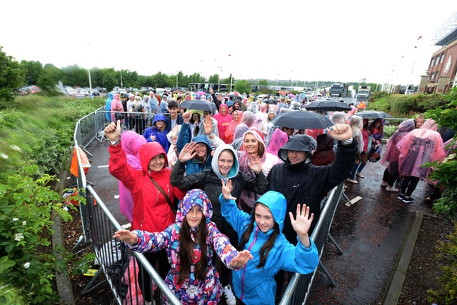 Who cares that the weather isn't the best. Not these fans. Are you pictured?