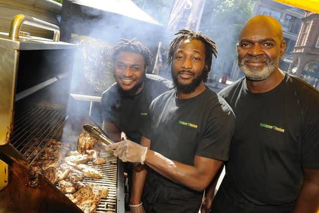 Sheffield Food Festival,City Centre. Pictured are Benjamin Samuels, Tinashe Mulomo and Robert Samuels of Caribbean Fusionâ. Picture: Steve Ellis