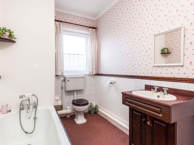 It's hard to fault the well-kept family bathroom, which consists of bath, low-flush WC and wash hand basin.