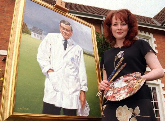 Artist Lucy J Lastique with her portrait of Cricket Umpire Dickie Bird, 1996.