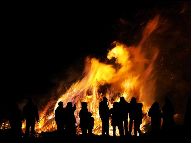 Two 36 year old men and a 43 year old woman were each issued a £10,000 fine by Merseyside police for breaching Covid rules after large crowds gathered for a bonfire and threw fireworks at officers in Wirral.
